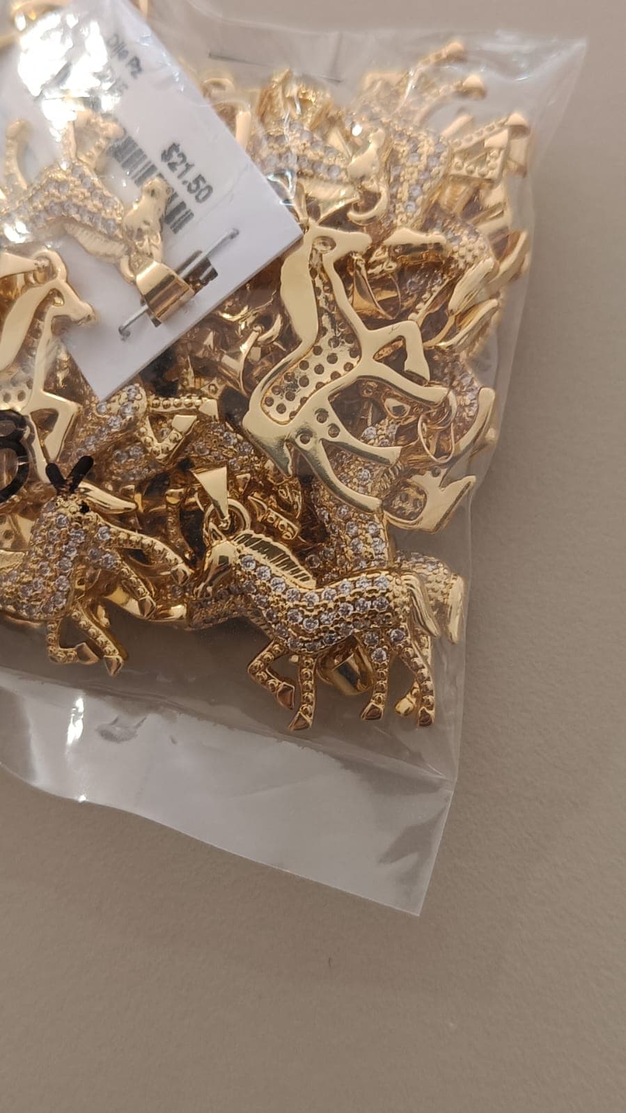 CABALLO CON ZIRCONIAS